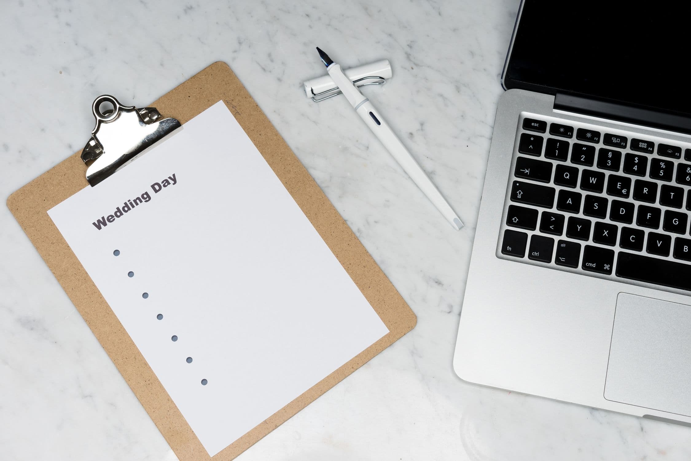 Best digital wedding invitation websites compared on laptop and phone