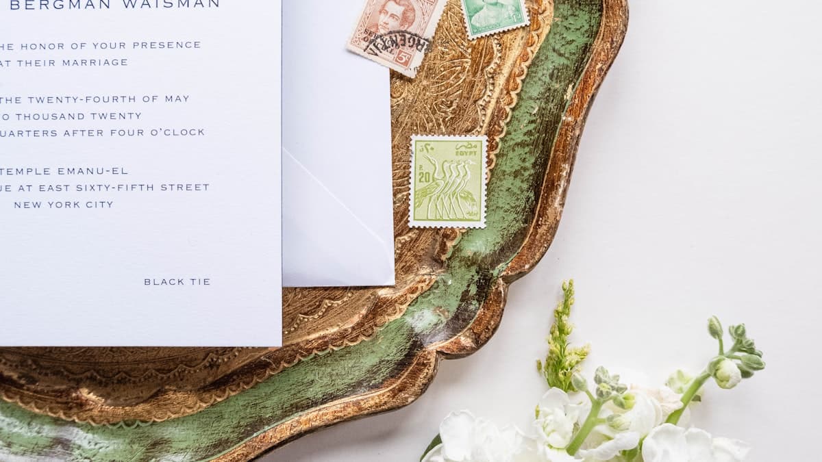 Wedding stationery flatlay showing traditional invitation design — Canva wedding invitation alternative comparison