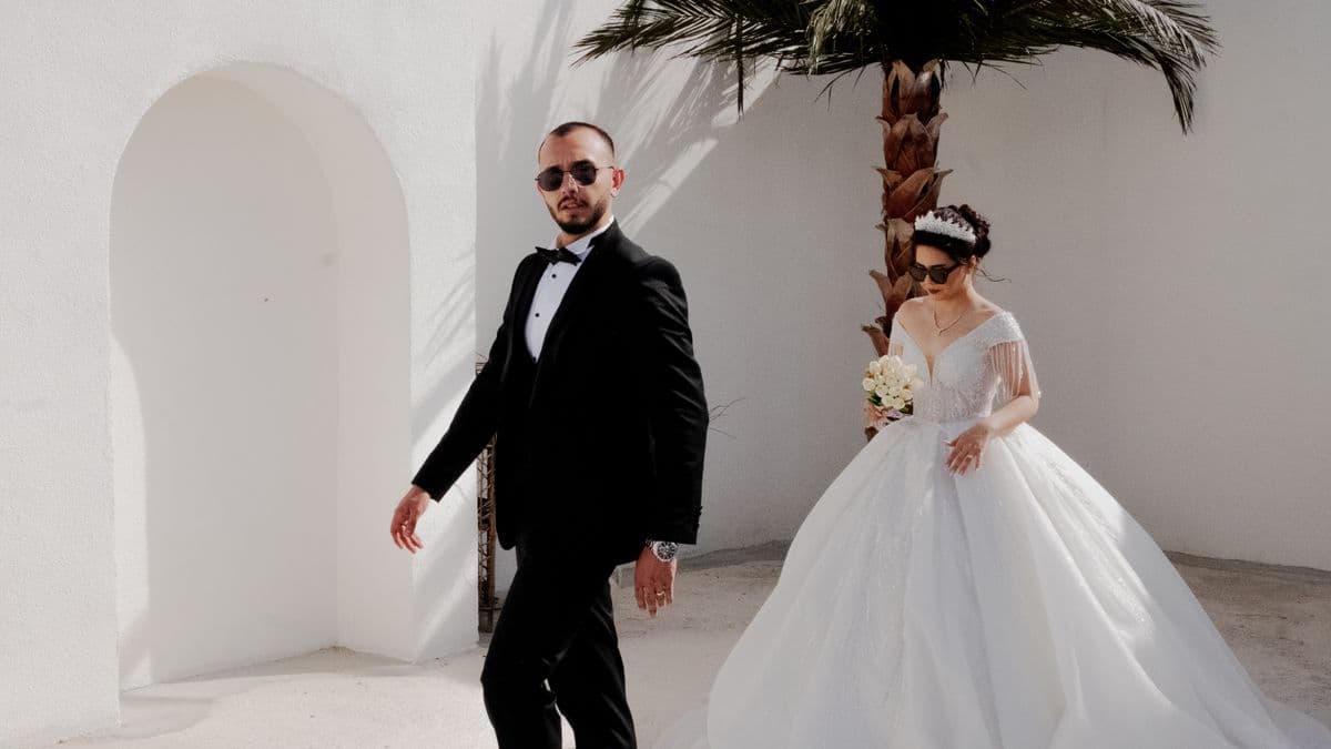 Wedding couple at a destination wedding venue for an international guest invite