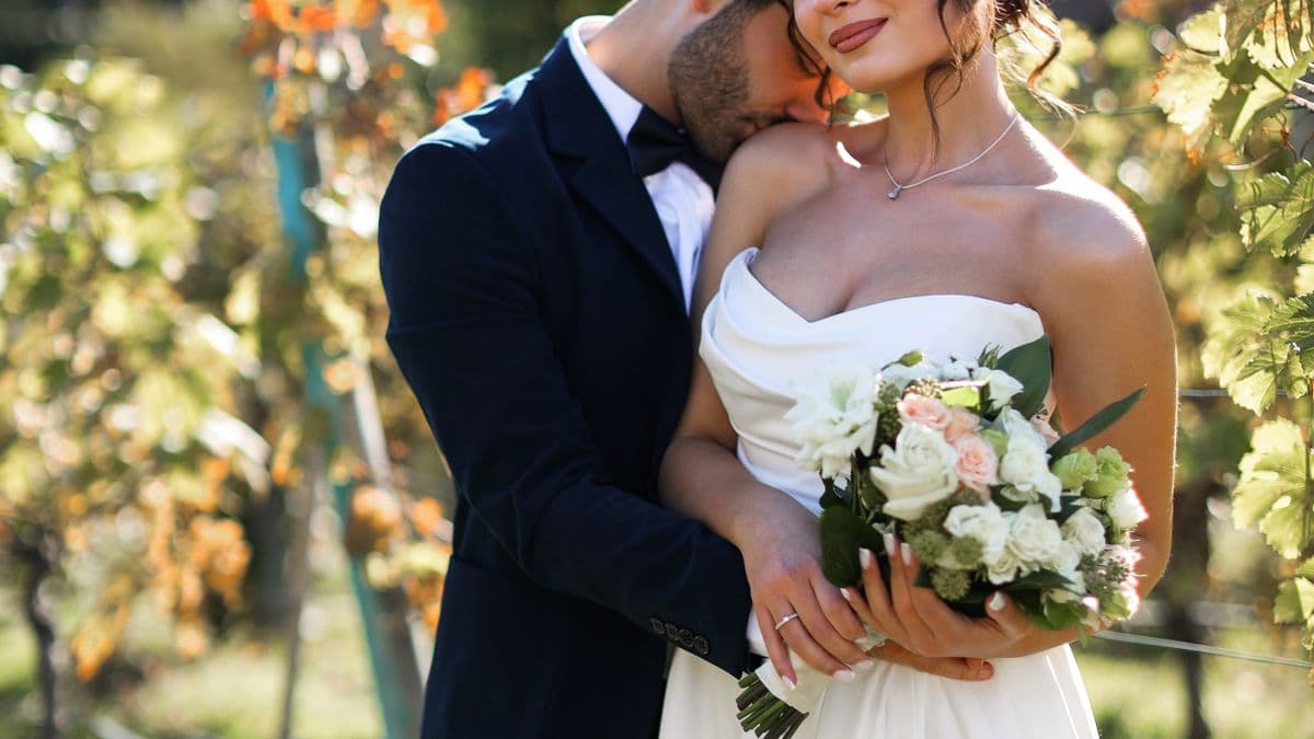 Bride and groom at a vineyard destination wedding in Italy