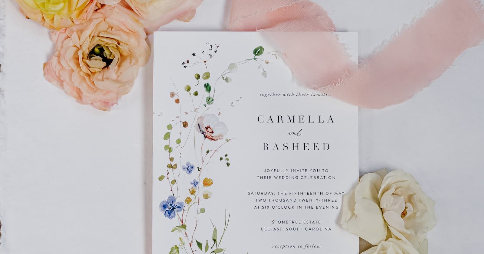 Wedding stationery suite with flowers, used as a cover for how to create a digital wedding invitation