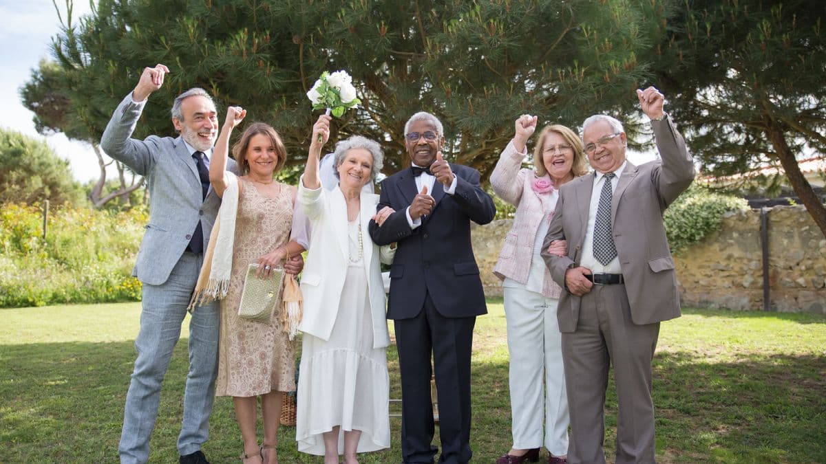 Wedding couple with international guests celebrating together at a destination wedding