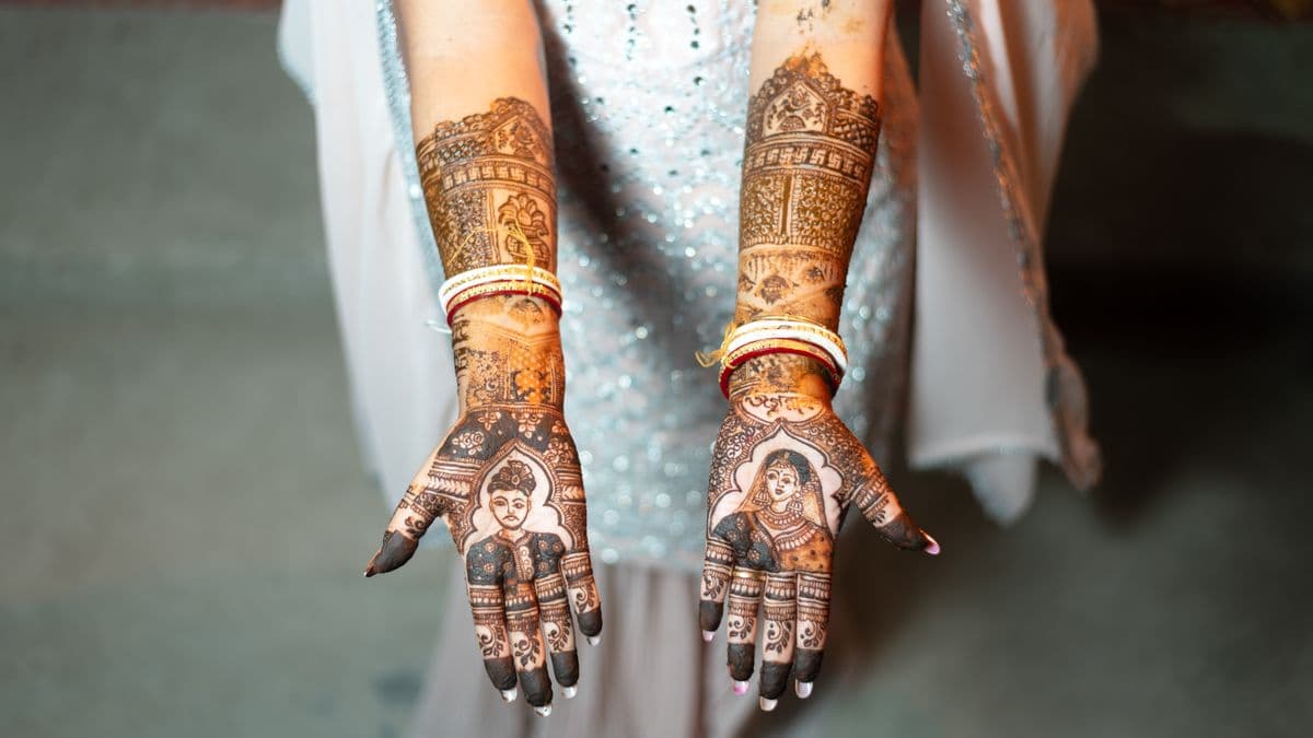 Bridal mehendi at an Indian wedding — planning a multi-event digital invitation
