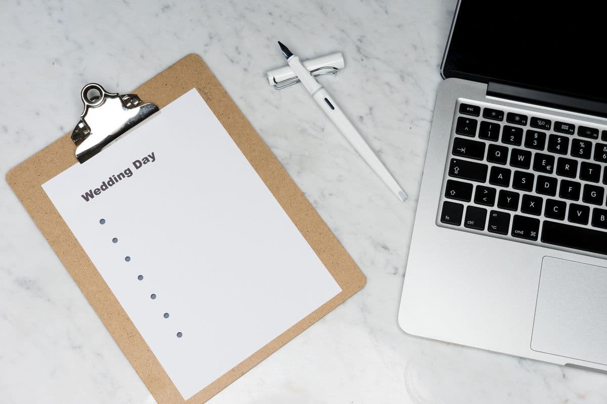 Wedding planning checklist and laptop — wedding RSVP tracking India setup