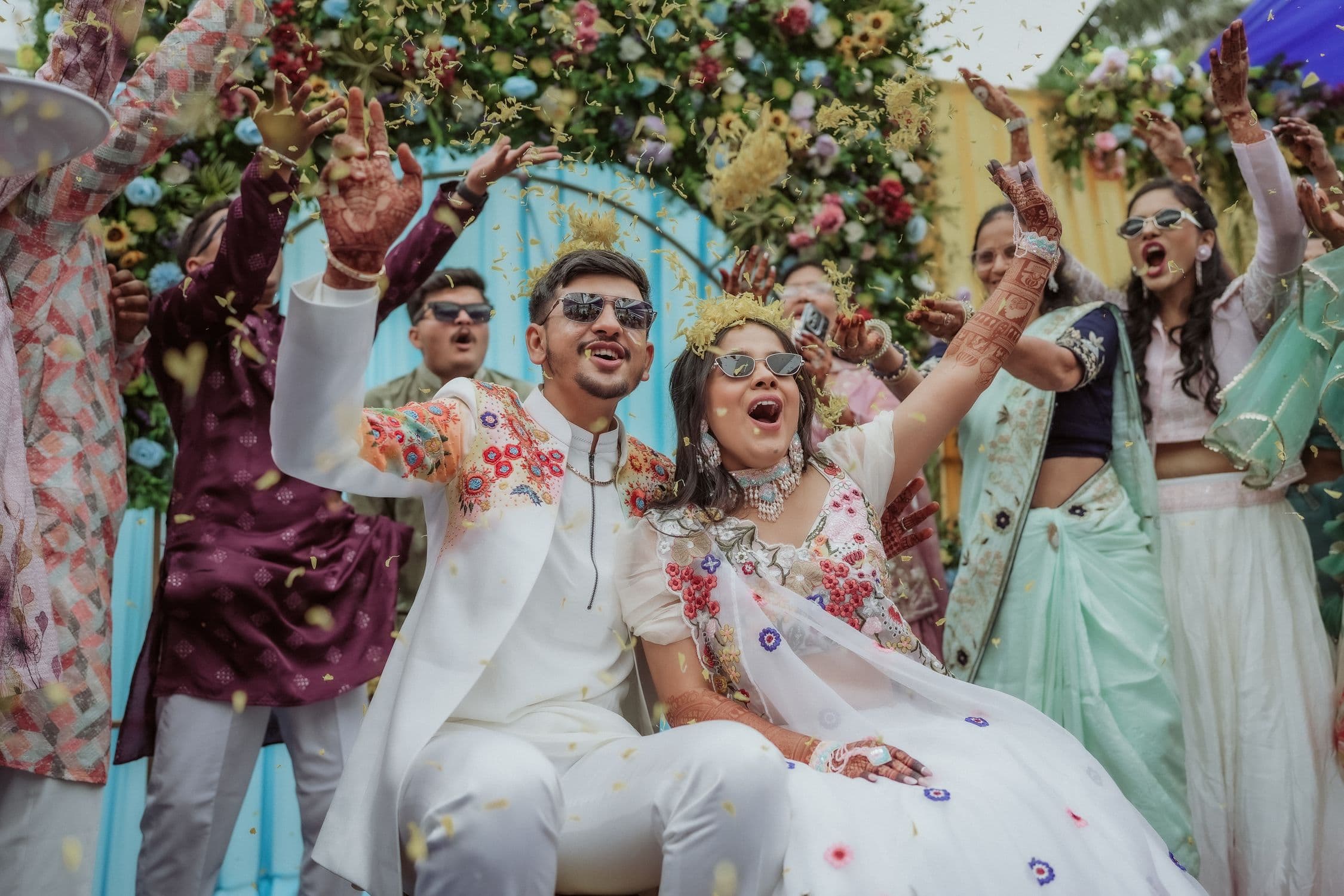 Indian mehendi ceremony celebration with traditional wedding decorations and festive colours