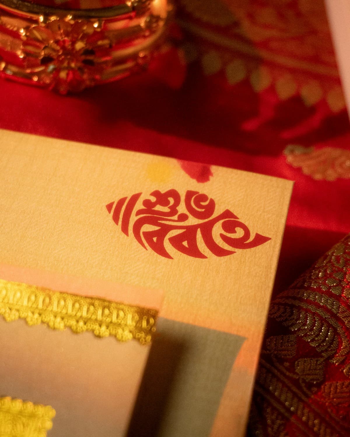 Traditional Indian wedding invitation card on a table — save the date digital India planning