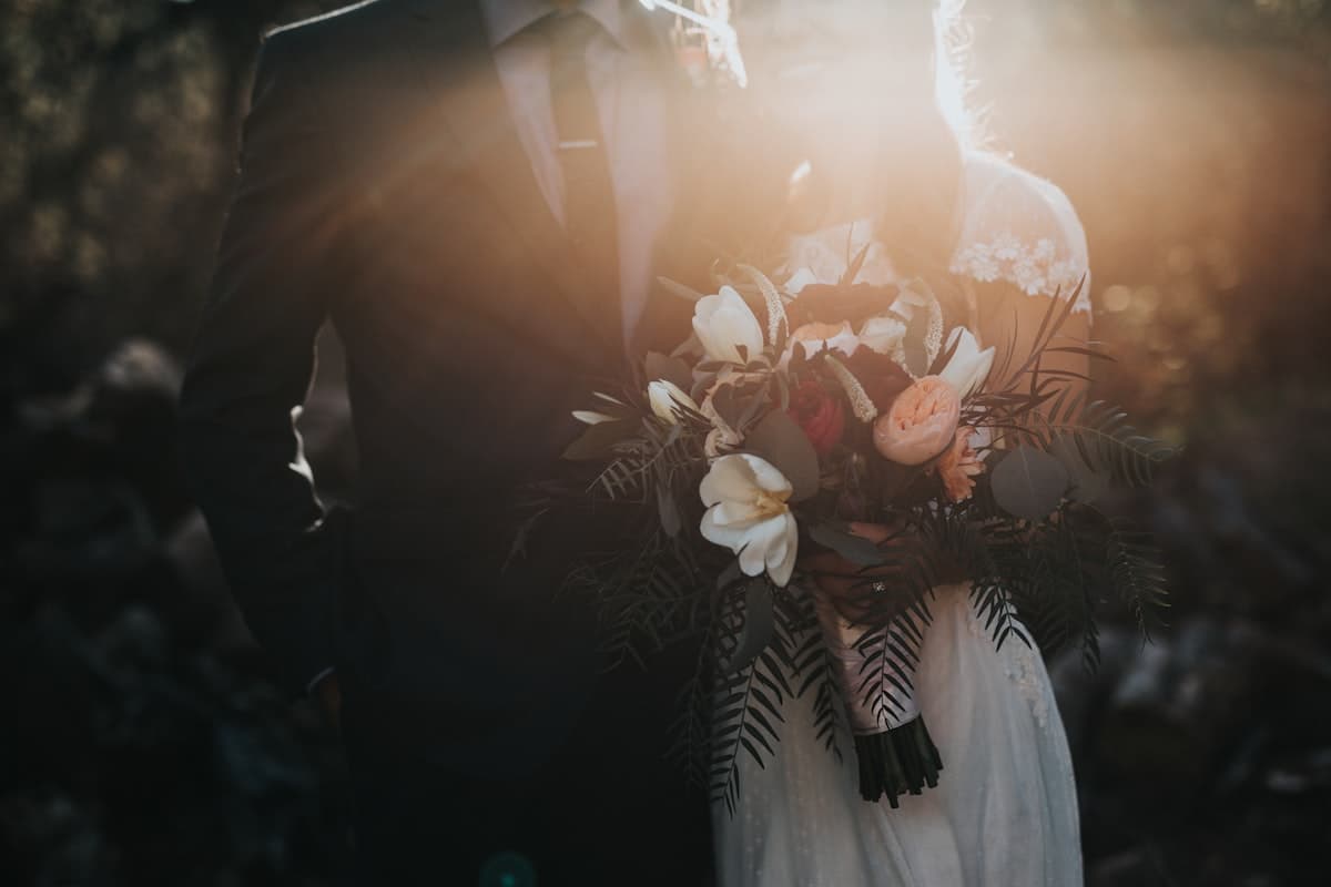 Wedding rings and planning details for a digital wedding invitation